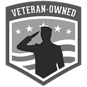 Black and white badge showing a saluting soldier silhouette, stars, stripes, and the text "Veteran-Owned" at the top—proudly representing Anchor Home Inspection.